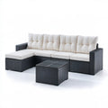 Narożna sofa ogrodowa z plecionki PE, czarno-kremowa, ze stolikiem 250 x 185 x 65 cm